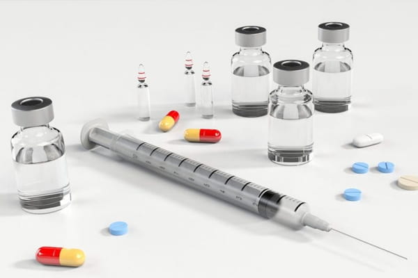 Injection with medicines and glass vials
