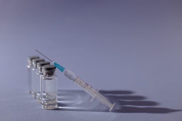 Injection with medicine glass bottles.